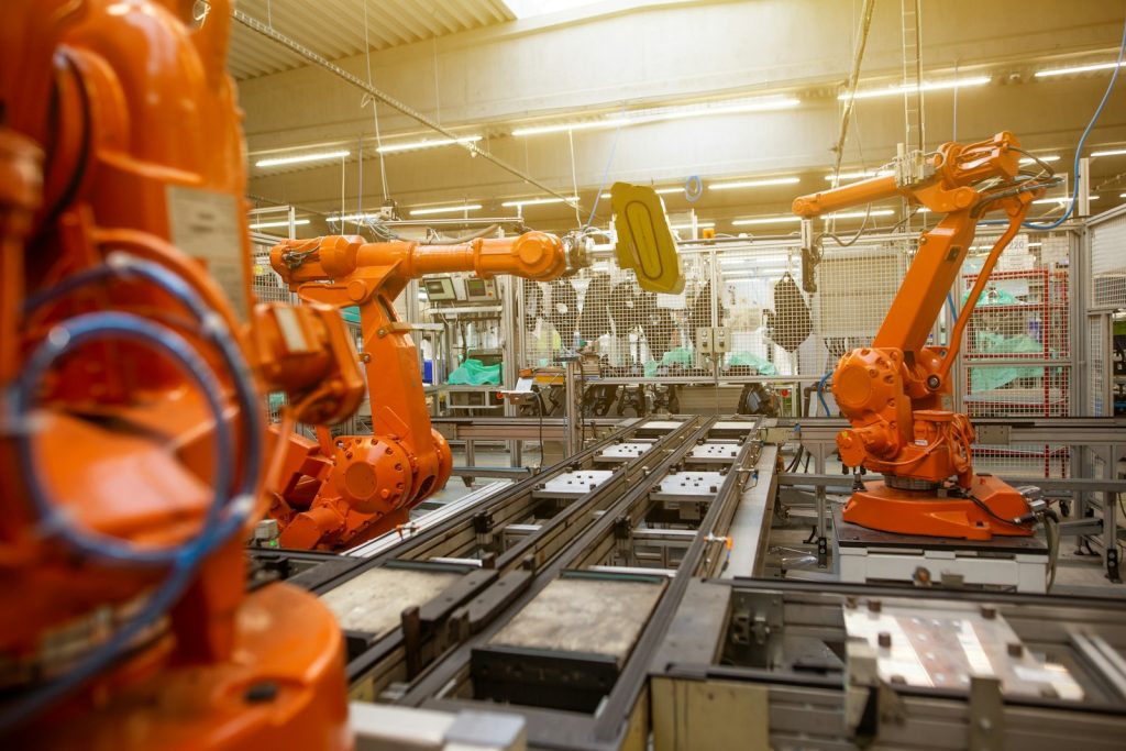 Industrial robots on a factory production line.