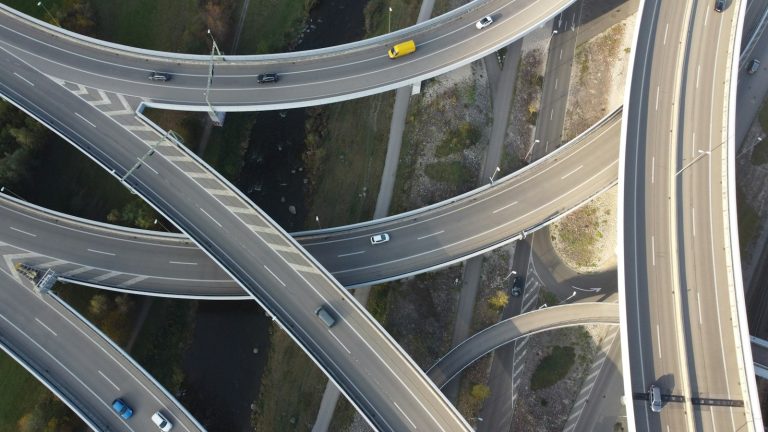 An aerial view of a multi-level highway interchange.