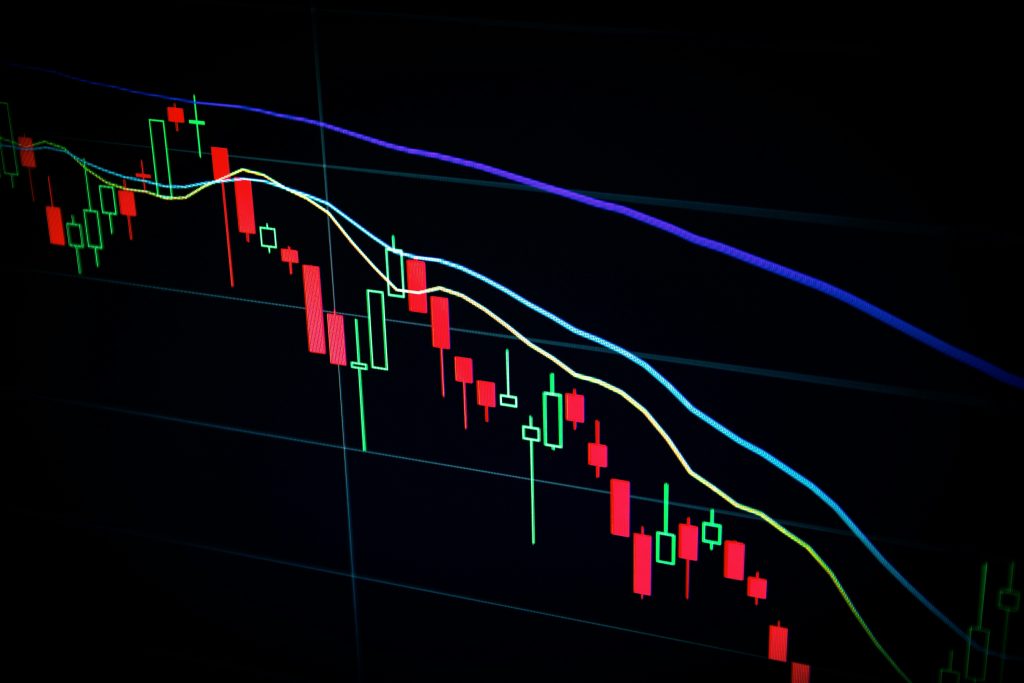 Illustrative financial market chart on a dark screen
