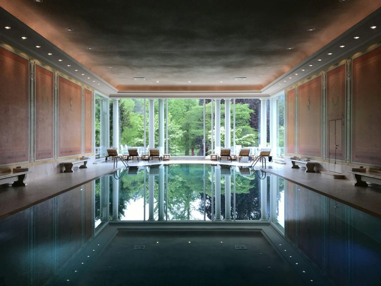 Indoor swimming pool with lanes and large windows