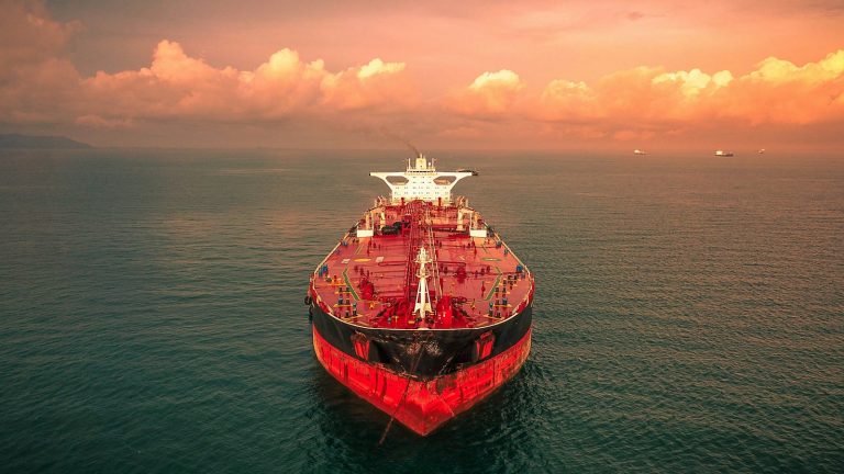 Large tanker ship travelling on open water