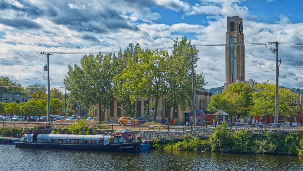 Lachine Canal in Montréal with the Atwater Market tower in the background.