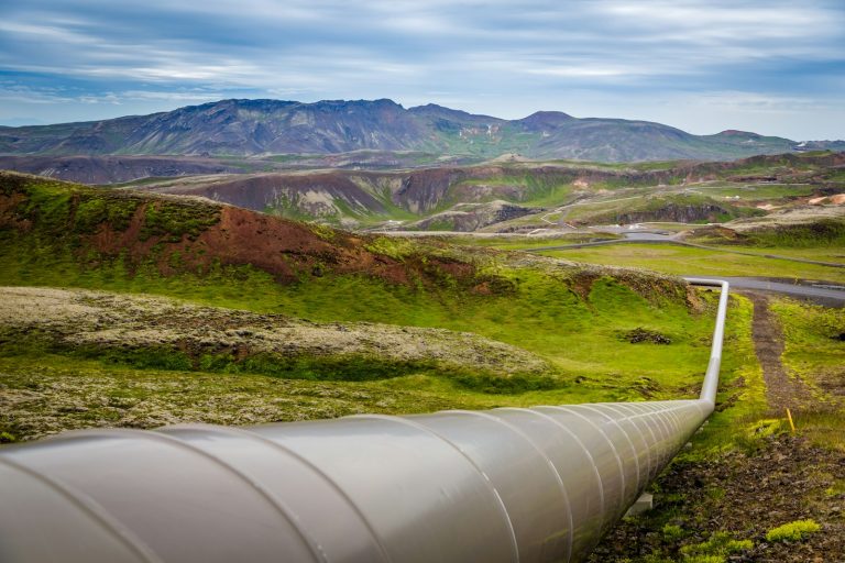 A pipeline crossing an open landscape.