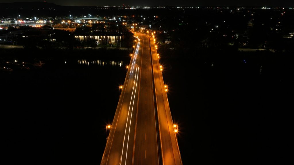 Aerial view of a divided Québec highway at night