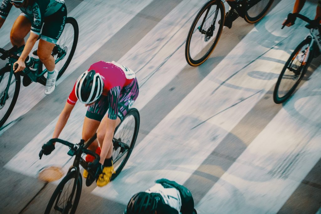 Road cyclists racing at speed, seen from above
