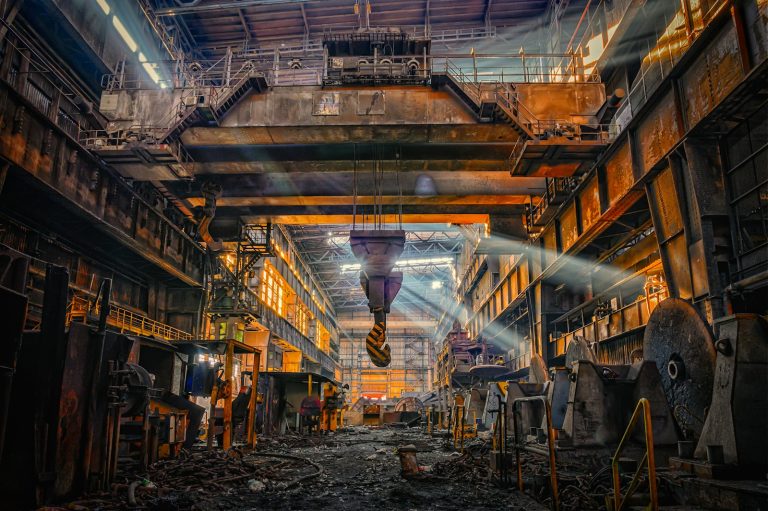 The interior of a large industrial steel plant.
