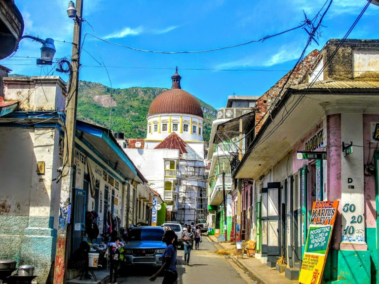 Street scene in Cap-Haïtien, Haiti, with the cathedral dome in the background