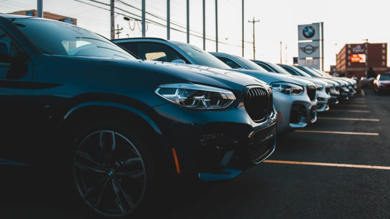 Rows of vehicles parked at a dealership