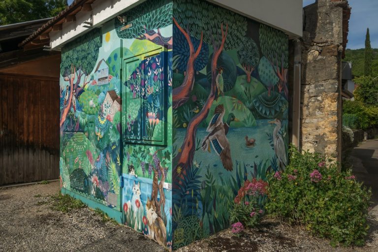 Colourful mural of forest plants and animals on a building exterior, illustrative stock image.