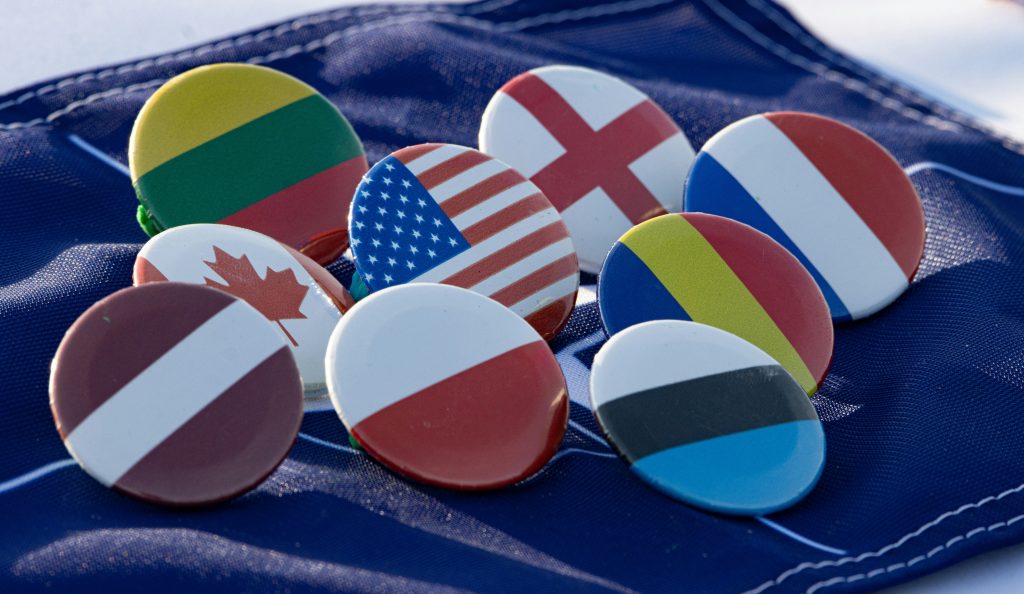 International flag pins including Canada and European countries