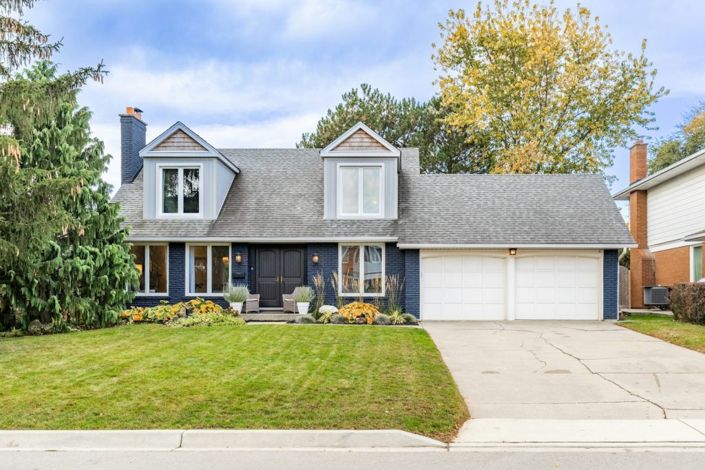 Detached home in winter, illustrating a federal home heat-pump rebate