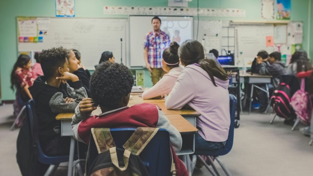Students listening during a classroom workshop